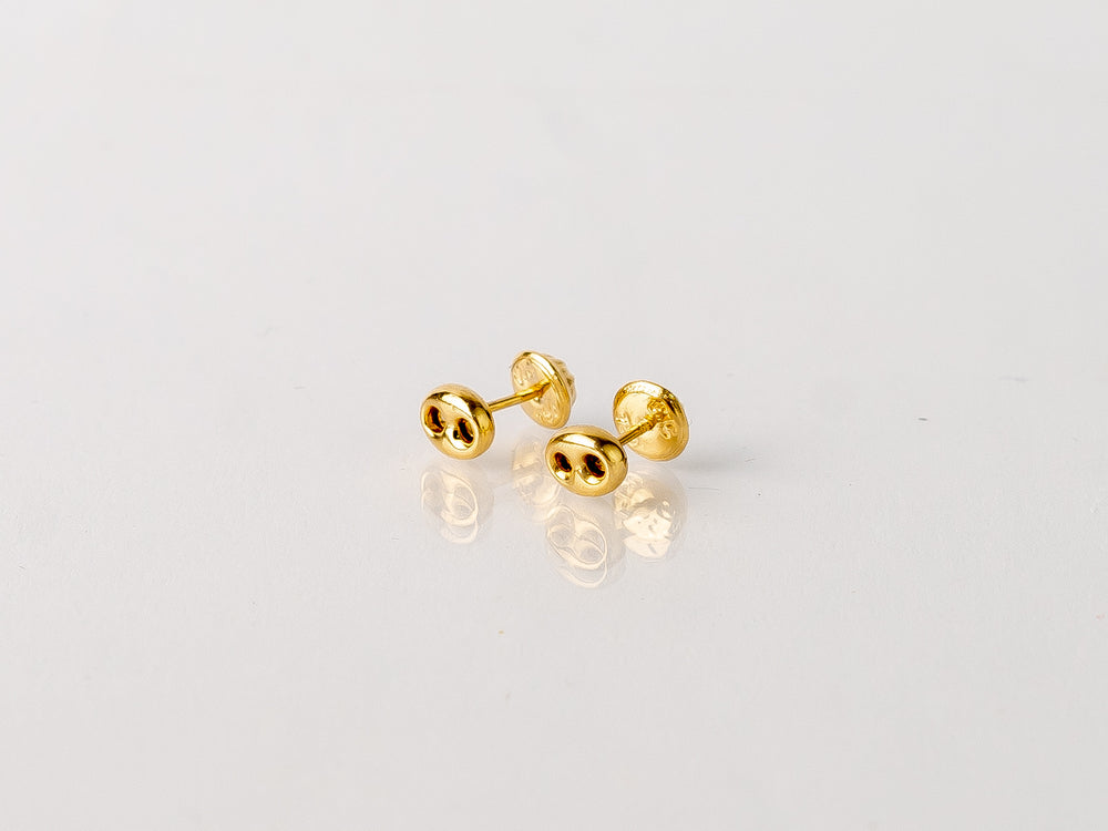 Topos Gucci Oro 18K