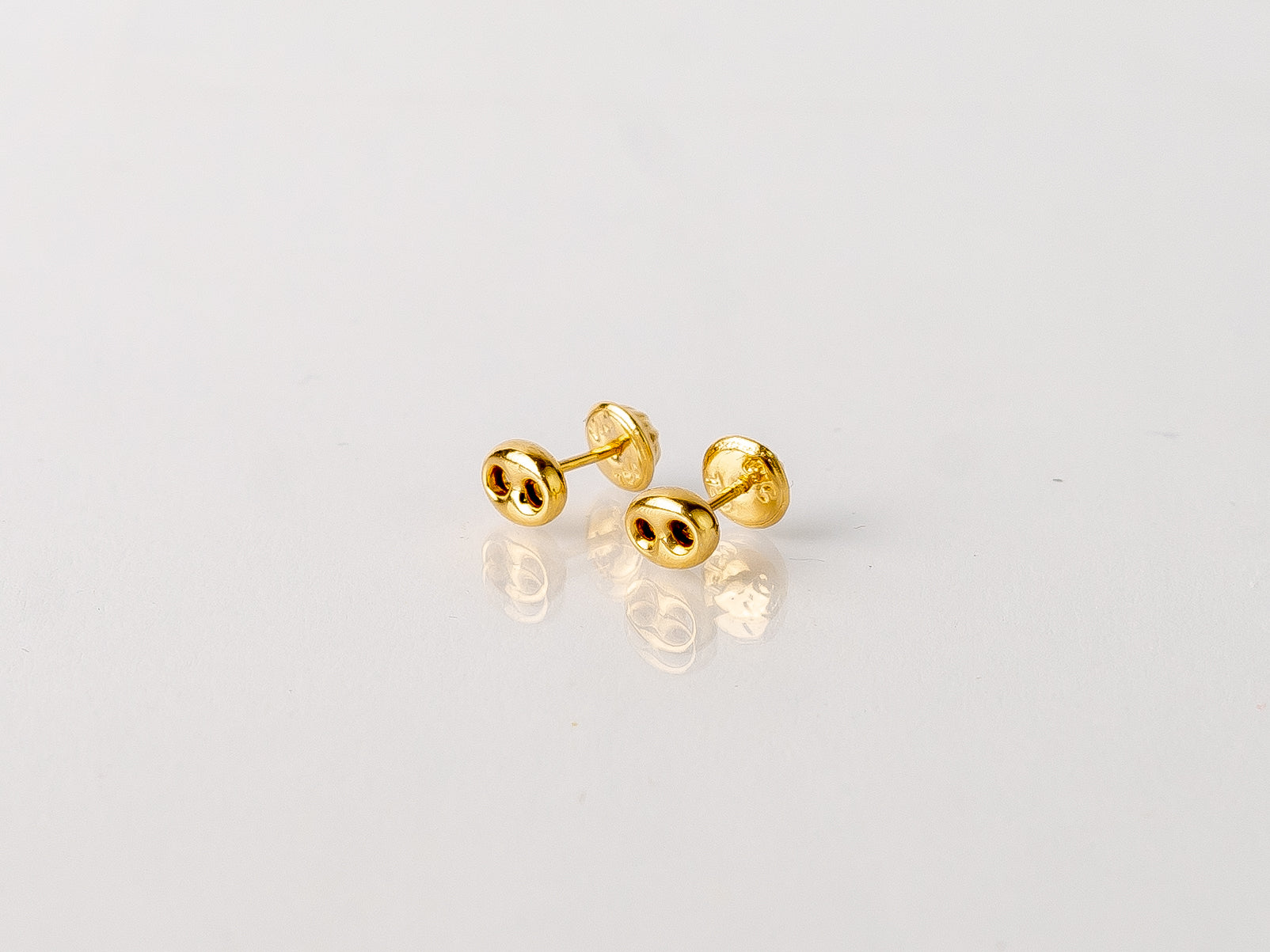 Topos Gucci Oro 18K